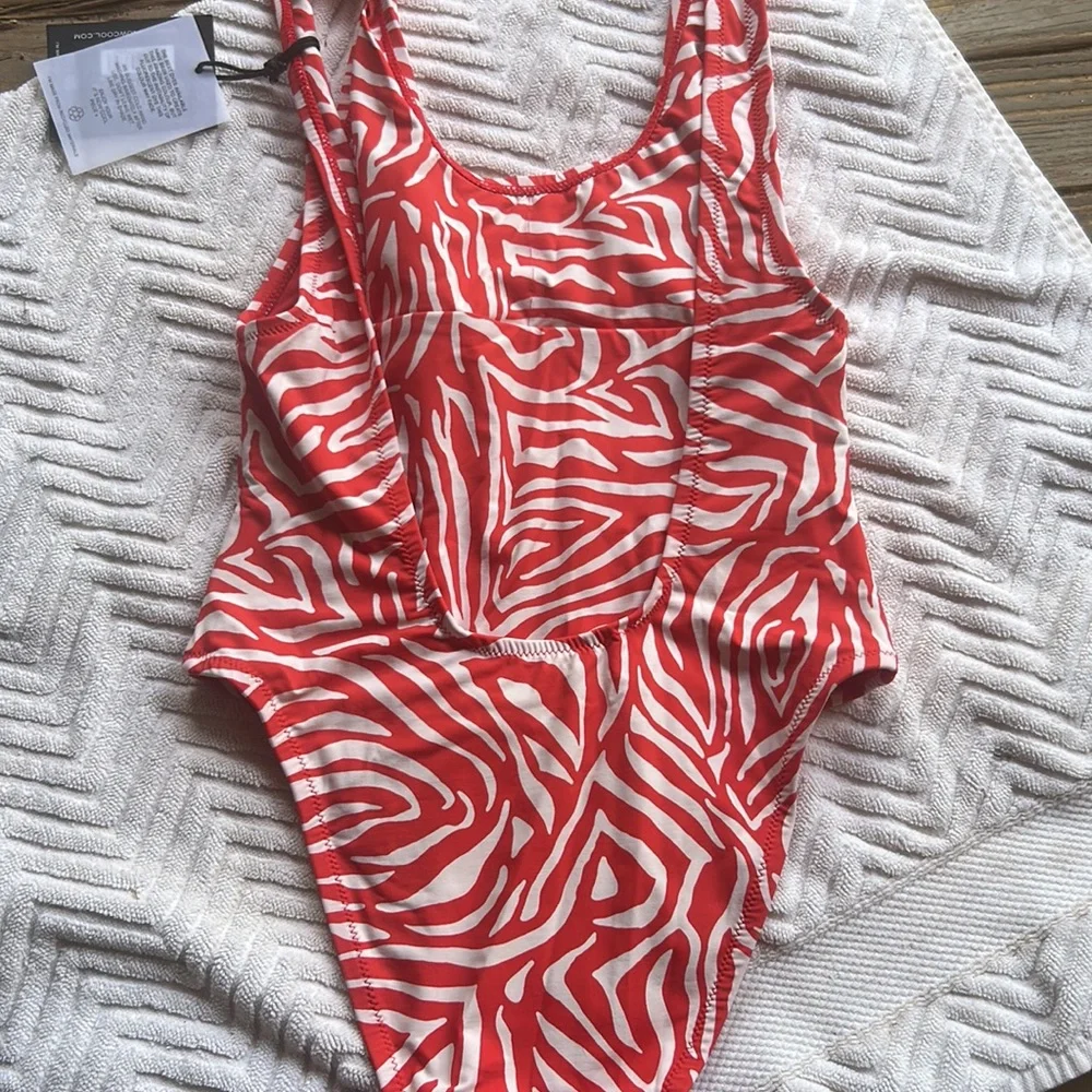 NWT FP x ITS NOW COOL the showtime one piece in fuego Zebra red white size small